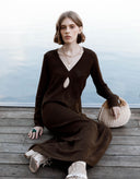 Woman wearing Evelyn chocolate brown viscose knit midi dress by Aina Gasse