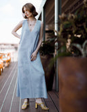 Woman wearing Catrine light blue sleeveless viscose maxi dress by Aina Gasse