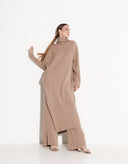 Full-length view of women’s beige Italian wool poncho and pants matching outfit