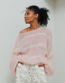 Woman wearing the Antonia caramel handmade mohair sweater by Aina Gasse