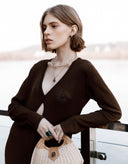 Side view of Evelyn chocolate brown designer midi dress with a slim silhouette