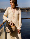 Front view of Evelyn vanilla fitted viscose midi dress with V-neckline
