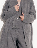 Close-up of soft gray wool-blend knit fabric on Aria oversized cardigan