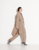 Side view of Aria beige asymmetrical cardigan with longer back and shorter front