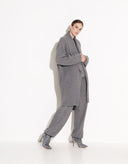 Full-length view of women’s gray long knit cardigan with relaxed silhouette
