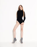 Front view of Celeste black designer bodysuit with long raglan sleeves